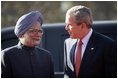 President George W. Bush is greeted by India's Prime Minister Manmohan Singh upon arrival Thursday, March 2, 2006, at the presidential residence in New Delhi.