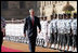 President George W. Bush reviews troops Thursday, March 2, 2006, during the arrival ceremony at Rashtrapati Bhavan, the presidential residence in New Delhi, welcoming he and Laura Bush to India.