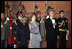 President and Mrs. Bush stand with India's President A.P.J. Abdul Kalam during the playing of their respective national anthems Thursday, March 2, 2006, at the State Dinner in New Delhi.