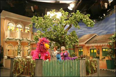 Mrs. Laura Bush meets characters on the set at Gali Gali Sim Sim (India's version of America's Sesame Street) studio, Thursday, March 2, 2006 in New Delhi, India, where she toured and taped a segment for the show.