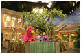 Mrs. Laura Bush meets characters on the set at Gali Gali Sim Sim (India's version of America's Sesame Street) studio, Thursday, March 2, 2006 in New Delhi, India, where she toured and taped a segment for the show.