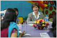 Mrs. Laura Bush listens to a question during an informal group discussion with teachers and students on her tour of Prayas, Thursday, March 2, 2006, in New Delhi, India.