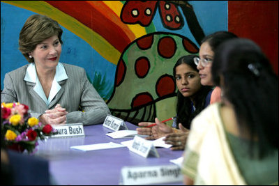 Mrs. Laura Bush listens to a question during an informal group discussion with teachers and students on her tour of Prayas, Thursday, March 2, 2006, in New Delhi, India.