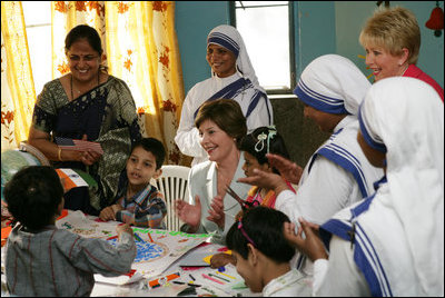 Mrs. Laura Bush meets with teachers and children, Thursday, March 2, 2006, during her visit to Mother Teresa's Jeevan Jyoti (Light of Life) Home for Disabled Children in New Delhi, India.