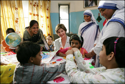 Mrs. Laura Bush meets with teachers and children, Thursday, March 2, 2006, during her visit to Mother Teresa's Jeevan Jyoti (Light of Life) Home for Disabled Children in New Delhi, India.