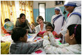 Mrs. Laura Bush meets with teachers and children, Thursday, March 2, 2006, during her visit to Mother Teresa's Jeevan Jyoti (Light of Life) Home for Disabled Children in New Delhi, India.