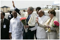 President George W. Bush and Laura Bush wave as they prepare to depart Hyderabad Airport Landing Zone for a return flight to New Delhi.