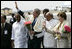 President George W. Bush and Laura Bush wave as they prepare to depart Hyderabad Airport Landing Zone for a return flight to New Delhi.