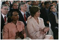 Laura Bush sits with Secretary of State Condoleezza Rice as they listen to President Bush's remarks Friday evening, March 3, 2006, in New Delhi.