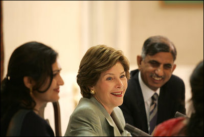 Mrs. Laura Bush addresses a roundtable discussion during an Education Through Partnerships meeting with representatives from USAID, UNESCO & CRI at library at the U.S. Embassy , Saturday, March 4, 2006 in Islamabad, Pakistan.