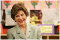 Mrs. Laura Bush reacts to a question as she attends a class lesson in the Children's Resources International clasroom at the U.S. Embassy , Saturday, March 4, 2006 in Islamabad, Pakistan.