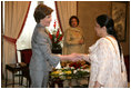 Mrs. Laura Bush greets guests during her meeting with Mrs. Sehba Musharraf, wife of President Pervez Musharraf, at Aiwan-e-Sadr, Saturday, March 4, 2006 in Islamabad, Pakistan.