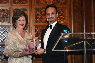 Mrs. Laura Bush is presented with an award by Kuwait Ambassador Al-Sabah, Tuesday evening, March 8, 2006 at the at "Bridges of Hope: Educating Children for a Better Future," The Kuwait-America Foundation's 2006 Benefit Dinner in Washington, in honor of her dedication to help improve the living conditions and education of children around the world.