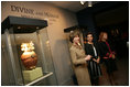 Mrs. Laura Bush, accompanied by Mrs. Marta Sahagun de Fox and Mrs. Eliane Karp de Toledo, talks with reporters following her tour of the Divine and Human: Women in Mexico and Peru Exhibit, Tuesday, March 14, 2006 at The National Museum of Women in the Arts in Washington.