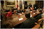 President George W. Bush and Mrs. Laura Bush meet Tuesday, March 21, 2006 in the Roosevelt Room of the White House, with members of the Iraq and Afghanistan Non-Govermental Organizations.