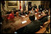 President George W. Bush and Mrs. Laura Bush meet Tuesday, March 21, 2006 in the Roosevelt Room of the White House, with members of the Iraq and Afghanistan Non-Govermental Organizations.