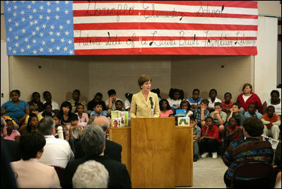 Mrs. Laura Bush, addressing an audience Wednesday, May 3, 2006 at the Gorenflo Elementary School in Biloxi, Miss., announces the distribution of $500,000 in grants for 10 Gulf Coast school libraries made possible by The Laura Bush Foundation for America's Libraries' Gulf Coast School Library Recovery Initiative.