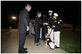 President George W. Bush and Laura Bush greet Marines following an Evening Parade, May 5, 2006, at the Marine Barracks in Washington, D.C.