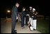 President George W. Bush and Laura Bush greet Marines following an Evening Parade, May 5, 2006, at the Marine Barracks in Washington, D.C.