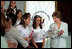 Laura Bush participates in an education roundtable at the Escuela de los Estados Unidos. San Jose, Costa Rica May 8, 2006.