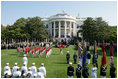 President George W. Bush and Australian Prime Minister John Howard inspect The Old Guard Fife and Drum Corps during the State Arrival Ceremony held for the Prime Minister on the South Lawn Tuesday, May 16, 2006.