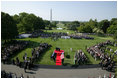 President George W. Bush and Australian Prime Minister John Howard stand for the playing of their respective country's National Anthems during the State Arrival Ceremony held for the Prime Minister on the South Lawn Tuesday, May 16, 2006.