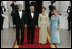 President George W. Bush, Prime Minister John Howard, Mrs. Laura Bush and Mrs. Janette Howard arrive at the White House for a State Dinner May 16, 2006.