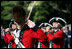 The Old Guard Fife and Drum Corps marches past President George W. Bush and Australian Prime Minister John Howard during a State Arrival Ceremony May 16, 2006 at The White House.