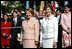 Mrs. Laura Bush and the wife of Australian Prime Minister John Howard Janette Howard stand during the State Arrival Ceremony on the South Lawn of The White House May 16, 2006.