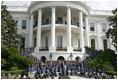 President George W. Bush and Laura Bush pose with the 2006 U.S. Winter Olympic and Paralympic teams during a congratulatory ceremony held on the South Lawn at the White House Wednesday, May 17, 2006.