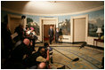 President George W. Bush, with Mrs. Laura Bush by his side, comments on the formation of the new govenment in Iraq, Sunday, May 21, 2006 in the Diplomatic Reception Room of The White House.