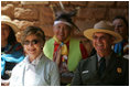 Mrs. Laura Bush and Mesa Verde National Park Superintendent Larry Wiese share a laugh, Thursday, May 23, 2006, during the celebration of the 100th anniversary of Mesa Verde and the Antiquities Act in Mesa Verde, Colorado. Also pictured are members of the Ute Mountain Ute Tribe.