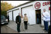 President George W. Bush and Laura Bush greet fellow voters after casting their ballots at the Crawford Fire Station in Crawford, Texas, Tuesday, Nov. 7, 2006. 