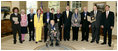 President George W. Bush and Mrs. Laura Bush stand with the recipients of the 2006 National Medal of Arts in the Oval Office Thursday, Nov., 9, 2006. Pictured from left, they are: Ben Jaffe and his mother Sandra Jaffe, director and co-founder of the Preservation Hall Jazz Band; Literary Translator Gregory Rabassa; Dancer Cyd Charisse; Photographer Roy DeCarava; Industrial Designer Viktor Schreckengost; Musician Dr. Ralph Stanley; Arts patron Billie Holladay; Composer William Bolcom; Interlochen Center for the Arts CEO Jeffrey Kimpton; and NEA Chairman Dana Gioia. 