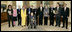 President George W. Bush and Mrs. Laura Bush stand with the recipients of the 2006 National Medal of Arts in the Oval Office Thursday, Nov., 9, 2006. Pictured from left, they are: Ben Jaffe and his mother Sandra Jaffe, director and co-founder of the Preservation Hall Jazz Band; Literary Translator Gregory Rabassa; Dancer Cyd Charisse; Photographer Roy DeCarava; Industrial Designer Viktor Schreckengost; Musician Dr. Ralph Stanley; Arts patron Billie Holladay; Composer William Bolcom; Interlochen Center for the Arts CEO Jeffrey Kimpton; and NEA Chairman Dana Gioia. 