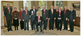 President George W. Bush and Mrs. Laura Bush stand with the 2006 National Humanities Medal recipients in the Oval Office Thursday, Nov., 9, 2006. Pictured from left, they are: Mark Noll, historian of religion; Mary Lefkowitz, classicist; Meryle Secrest, biographer; Bernard Lewis, Middle Eastern scholar; John Raisian senior fellow and director of the Hoover Institution; Robert Fagles, translator and classicist; Nickolas Davatzes, historian; Kevin Starr, historian; Fouad Ajami, Middle Eastern studies scholar; James Buchanan, economist; and NEH chairman Bruce Cole.