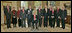 President George W. Bush and Mrs. Laura Bush stand with the 2006 National Humanities Medal recipients in the Oval Office Thursday, Nov., 9, 2006. Pictured from left, they are: Mark Noll, historian of religion; Mary Lefkowitz, classicist; Meryle Secrest, biographer; Bernard Lewis, Middle Eastern scholar; John Raisian senior fellow and director of the Hoover Institution; Robert Fagles, translator and classicist; Nickolas Davatzes, historian; Kevin Starr, historian; Fouad Ajami, Middle Eastern studies scholar; James Buchanan, economist; and NEH chairman Bruce Cole.