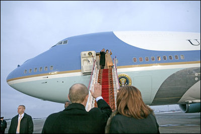 President George W. Bush and Mrs. Laura Bush wave goodbye to President Vladimir Putin and Mrs. Lyudmila Putina after a brief visit Wednesday, Nov. 15, 2006, in Moscow before heading to Singapore.