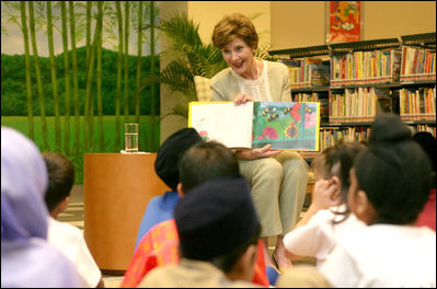 Mrs. Laura Bush reads Miss Spider's Tea Party during her visit Thursday, Nov. 16, 2006, to the National Library Building's Children's Reading Room in Singapore. Afterward, Mrs. Bush participated in a brief question-and-answer session with the kids. 