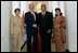 President George W. Bush and Mrs. Laura Bush are greeted by President Susilo Bambang Yudhoyono of Indonesia and Herawati Yudhoyono at the Presidential Palace in Bogor, Indonesia, after arriving in the country for a six-hour visit Monday, Nov. 20, 2006.