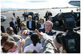 President George W. Bush and Laura Bush shake hands with military personnel as they prepare to depart Honolulu, Hawaii, Tuesday, Nov. 21, 2006, for their flight home to Washington, D.C., following their eight-day trip to Asia.