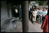 Mrs. Laura Bush is joined by other spouses of APEC leaders Saturday, Nov. 18, 2006, as they tour the Temple of Literature in Hanoi, site of the 2006 APEC summit.