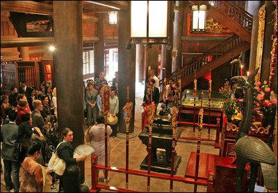 Spouses of the APEC leaders, including Mrs. Laura Bush, center, join in a tour of the Temple of Literature in Hanoi Saturday, Nov. 18, 2006.