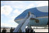 President George W. Bush and Laura Bush wave as they depart Honolulu, Hawaii, Tuesday, Nov. 21, 2006, for their flight home to Washington, D.C., following their eight-day trip to Asia.