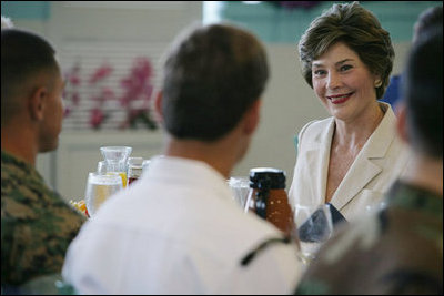 Mrs. Laura Bush visits during breakfast with military personnel Tuesday, Nov. 21, 2006, at the Officers Club at Hickam Air Force Base in Honolulu, Hawaii.