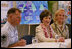 Mrs. Laura Bush is joined by Mary Fallon, right, wife of Navy Admiral William J. Fallon the Commander of the U.S. Pacific Command, during a roundtable discussion with military personnel Tuesday, Nov. 21, 2006, on military housing and educational services provided to families stationed in Honolulu, Hawaii.