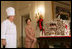 Mrs. Laura Bush and former chef Roland Mesnier discuss the gingerbread White House with the press in the State Dining Room Thursday, Nov. 30, 2006. The house consists of more than 300 pounds of dark chocolate and gingerbread.