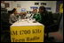 Mrs. Laura Bush participates in a radio interview with Amber Bellamy, age 17, left, and Elliott White, Jr., age 22, Wednesday, October 4, 2006, during a visit to the Children's Training Network/AM 1700 Radio Program in Buffalo, New York, as part of the President's Helping America's Youth initiative. Together with Crucial Human Service Center and other Buffalo community programs, AM 1700 Station encourages caring adults to connect as mentors with high-risk youth.