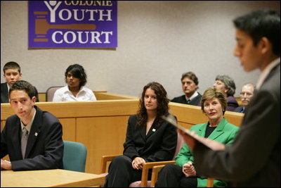 Laura Bush: Helping America's Youth (HAY) Visit to Colonie Youth Court. Latham, New York. Mock trial. As part of the President's Helping America's Youth initiative, Mrs. Laura Bush observes a mock trial at the Colonie Youth Court in Latham, New York, Wednesday, October 4, 2006. The Colonie Youth Court has been recognized by the U.S. Department of Justice as a national model of effective programming to help at-risk youth. The court has been replicated in more than 80 communities in the state of New York.