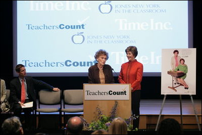 Mrs. Laura Bush stands with her second grade teacher, Charlene Gnagy, as Mrs. Gnagy speaks to the audience Thursday, October 5, 2006, during the TeachersCount "Behind every famous person is a fabulous teacher" PSA campaign launch ceremony in New York City. The campaign is to help create awareness for teachers and the role they play in the lives of children and to raise the status of the teaching profession.